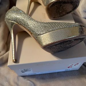 Jimmy Choo open toe platform pump in a champagne glitter